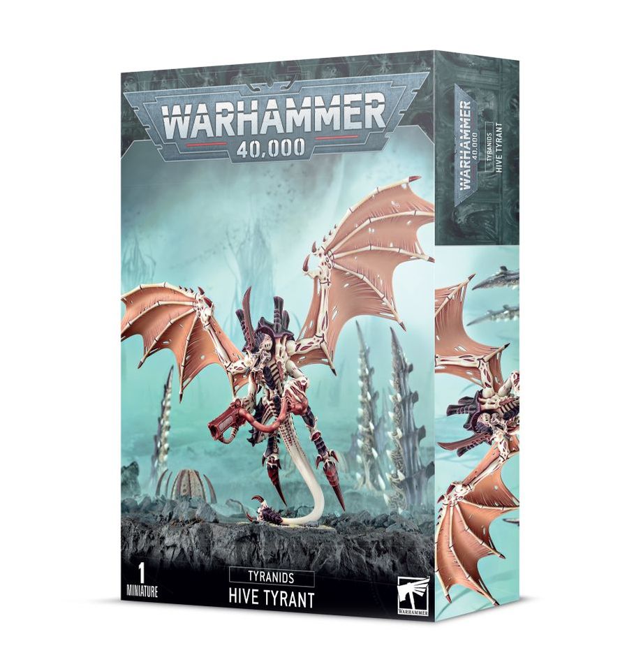 Close-up of a Tyranids Hive Tyrant model from Games Workshop, showcasing detailed alien creature with multiple limbs and bio-organic armor.