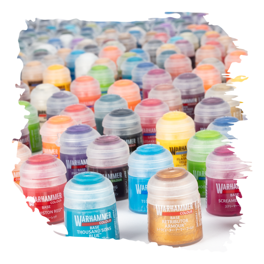 Collection of Warhammer paint bottles in various colors on a white background