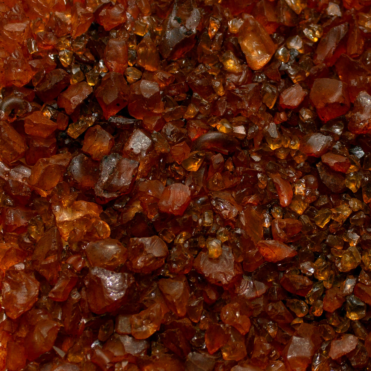 Amber glass rocks ranging from 1 to 10mm, used as basing material for miniatures and dioramas by Geek Gaming Scenics.